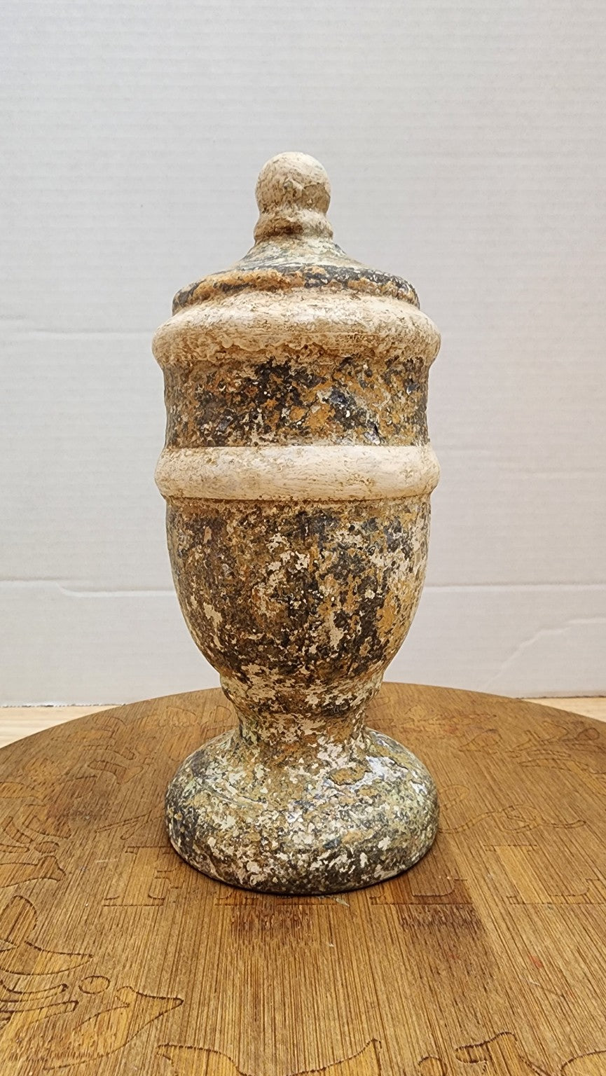 Wood finial with hand-finished cracked layered patina, front view