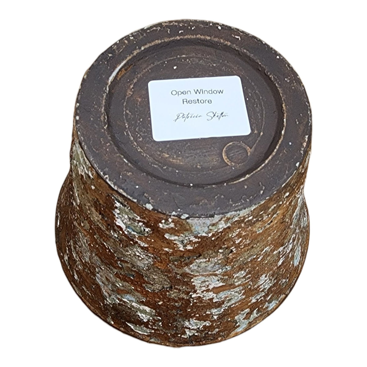 Open Window Restore label on resin planter