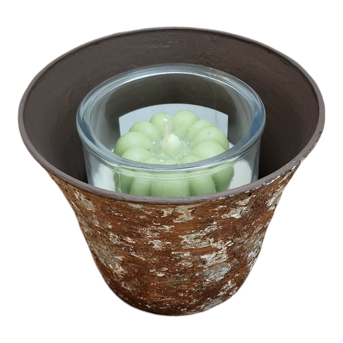 Layered resin planter styled with candle
