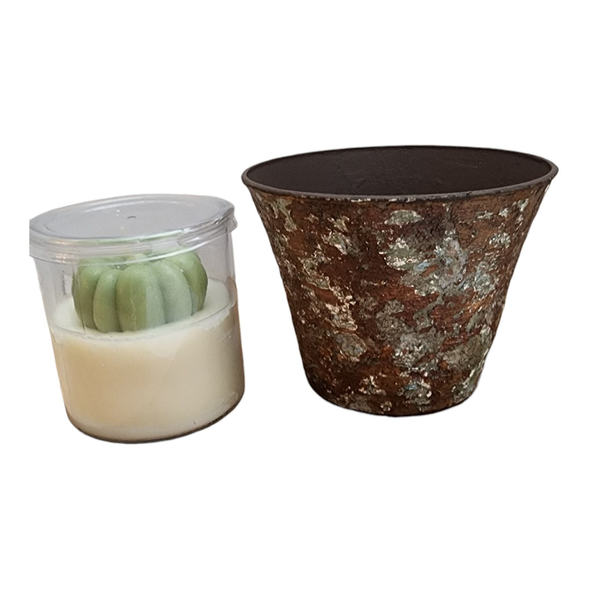 Resin planter shown beside candle for scale