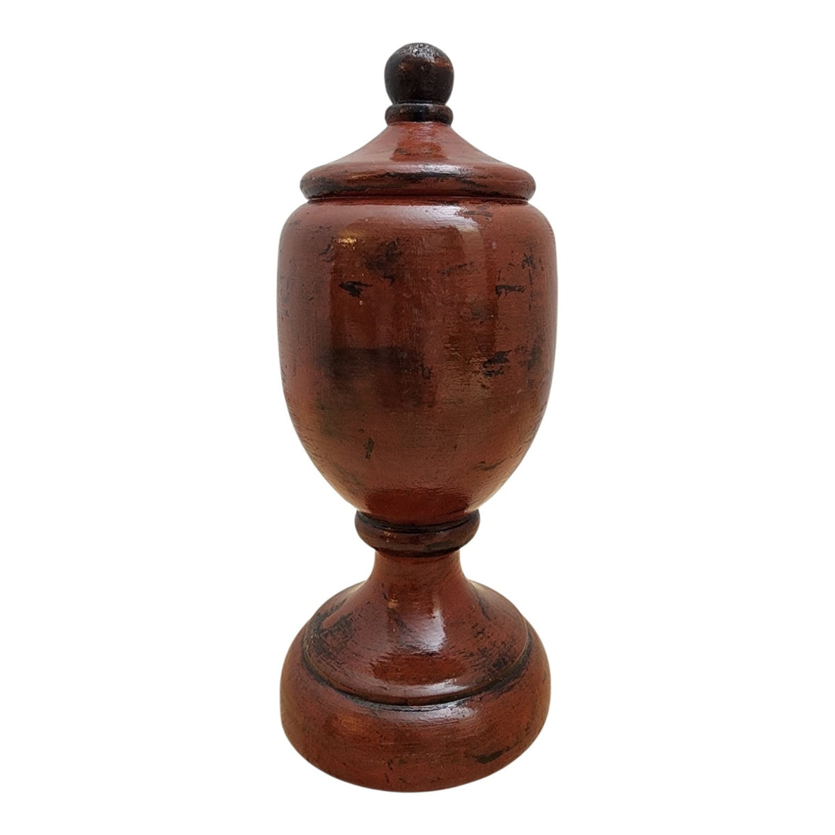 Solid wood decorative vessel with layered red and black Negoro Nuri inspired finish, side view