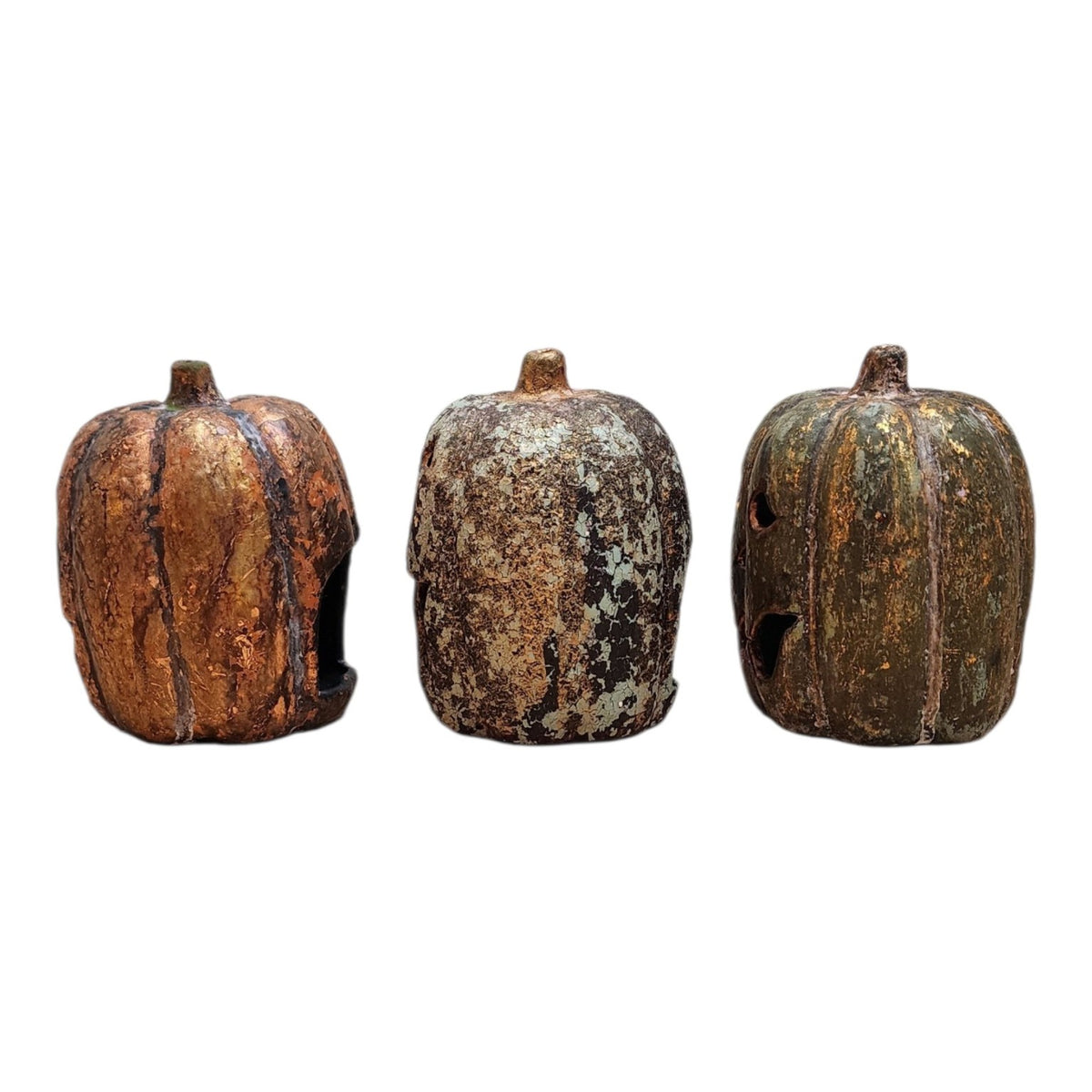 Back view showing the candle openings on three hand-finished ceramic pumpkins