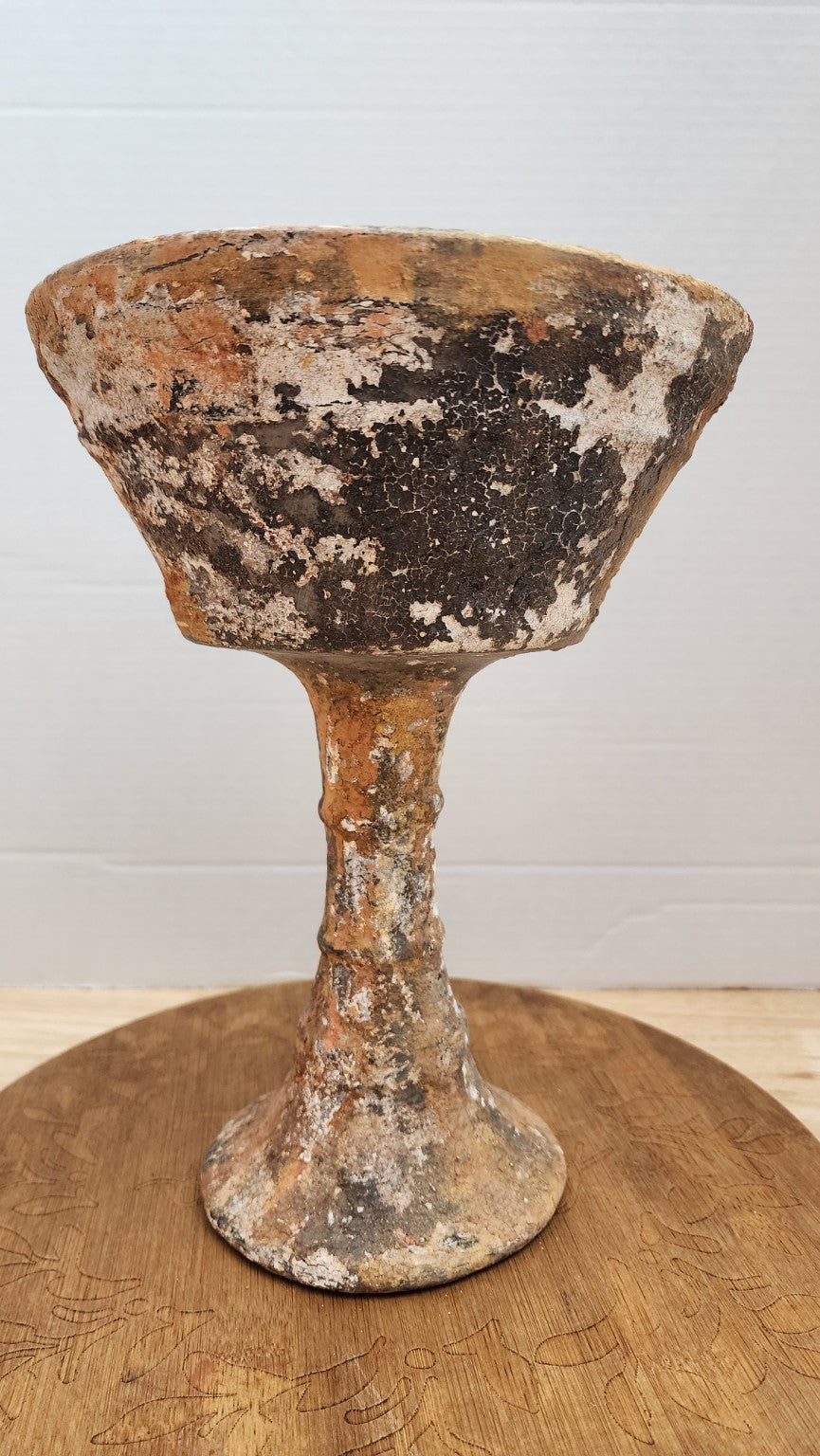 Weathered chalice urn side view