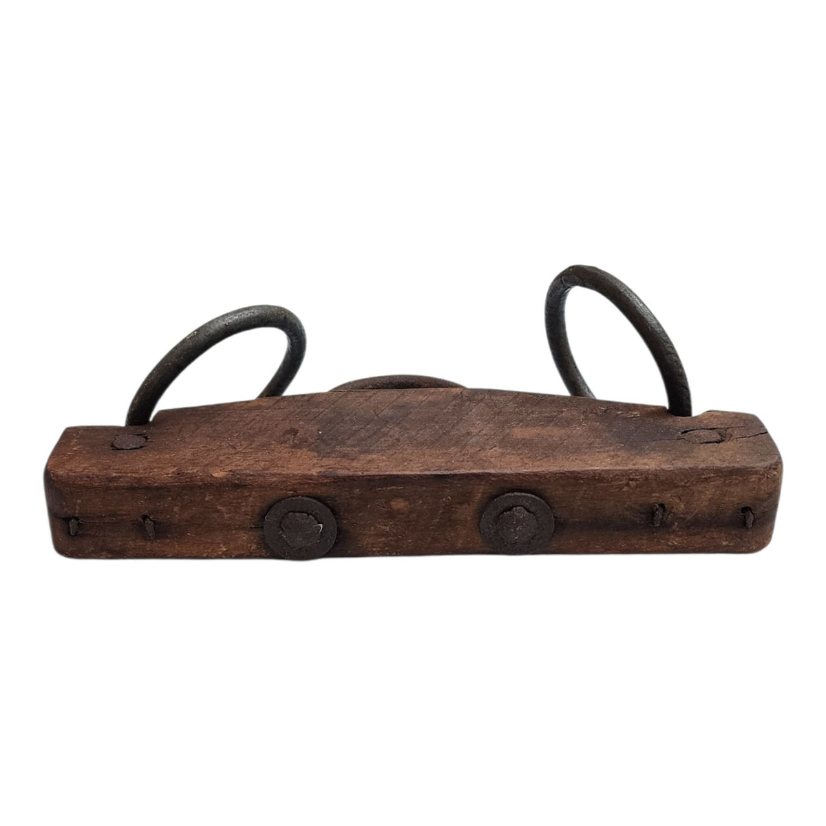 Vintage wood and iron harness form showing aged construction